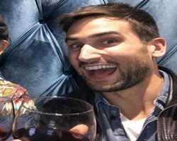 Scott Cavalheiro consuming alcohol